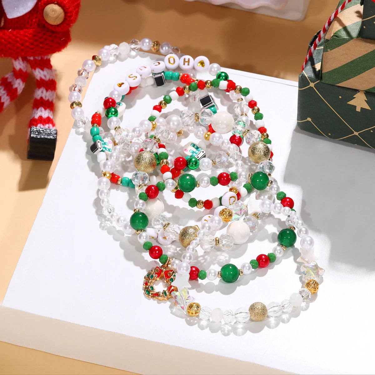 Quality Premium Style 8 Piece New Christmas Star & Snowman Beaded Bracelet Set (color random)